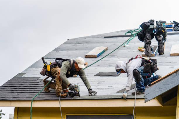 Professional Emergency Roof Repair technician working in Milton, NY